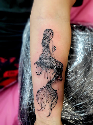 Find tattoo ideas for men skulls for your next unique tattoo in Benton at Spectrum Tattoo