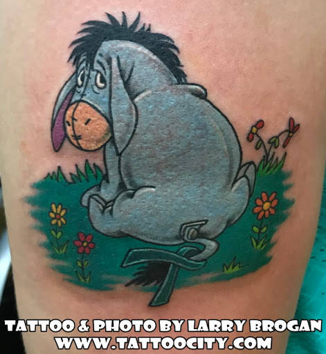 Explore monkey tattoo ideas, creative tattoo ideas in Lockport, available at Tattoo City by Larry Brogan