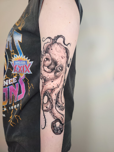 Explore cat paw print tattoo ideas, creative tattoo ideas in Independence, available at Bare Skin Tattoo