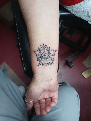 Tattoo Shop «Bloody Wolf Tattoo & Piercing & Tattoo Supply», reviews and photos, 4139 W Bell Rd, Phoenix, AZ 85053, USA