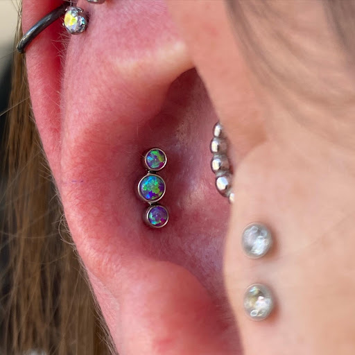 Explore female tattoo sleeve ideas, creative tattoo ideas in Dover, available at Agap Body Piercings