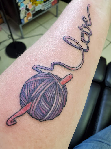 Explore new chapter tattoo ideas, creative tattoo ideas in Grand Rapids, available at Anarchy Ink Tattoos LLC