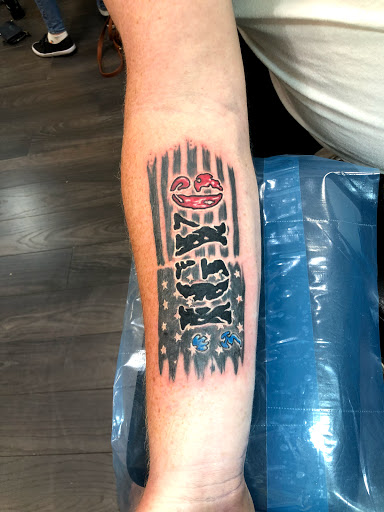 Tattoo Shop «Scratch The Surface Tattoo», reviews and photos, 6550 International Dr #111, Orlando, FL 32819, USA