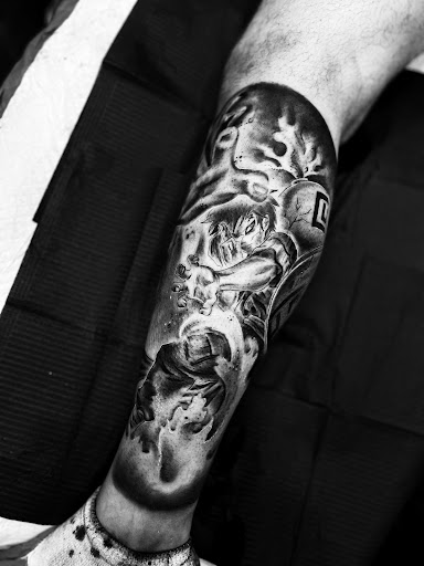 Explore thigh tattoos ideas for guys, creative tattoo ideas in East Stroudsburg, available at Faimeouz Ink