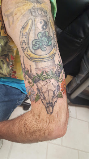 Explore halloween sleeve tattoo ideas, creative tattoo ideas in Wilmington, available at Wildcard Studios