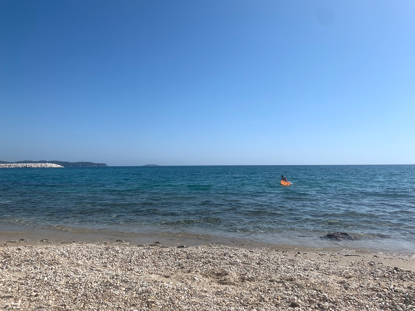 Photo of Aegean beach with turquoise pure water surface