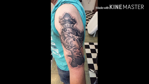 Explore lower arm tattoos ideas for guys, creative tattoo ideas in Maryville, available at Distinked Tattoo