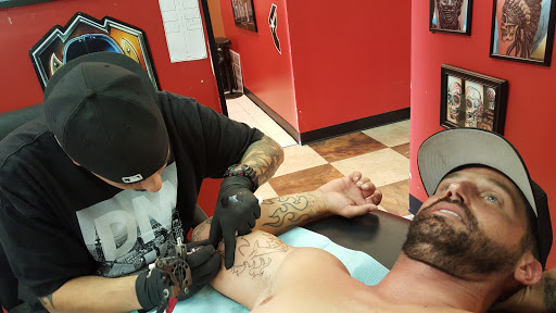 Explore alice and wonderland tattoo ideas, creative tattoo ideas in Spartanburg, available at Lucky Dice Tattoo Shop Spartanburg