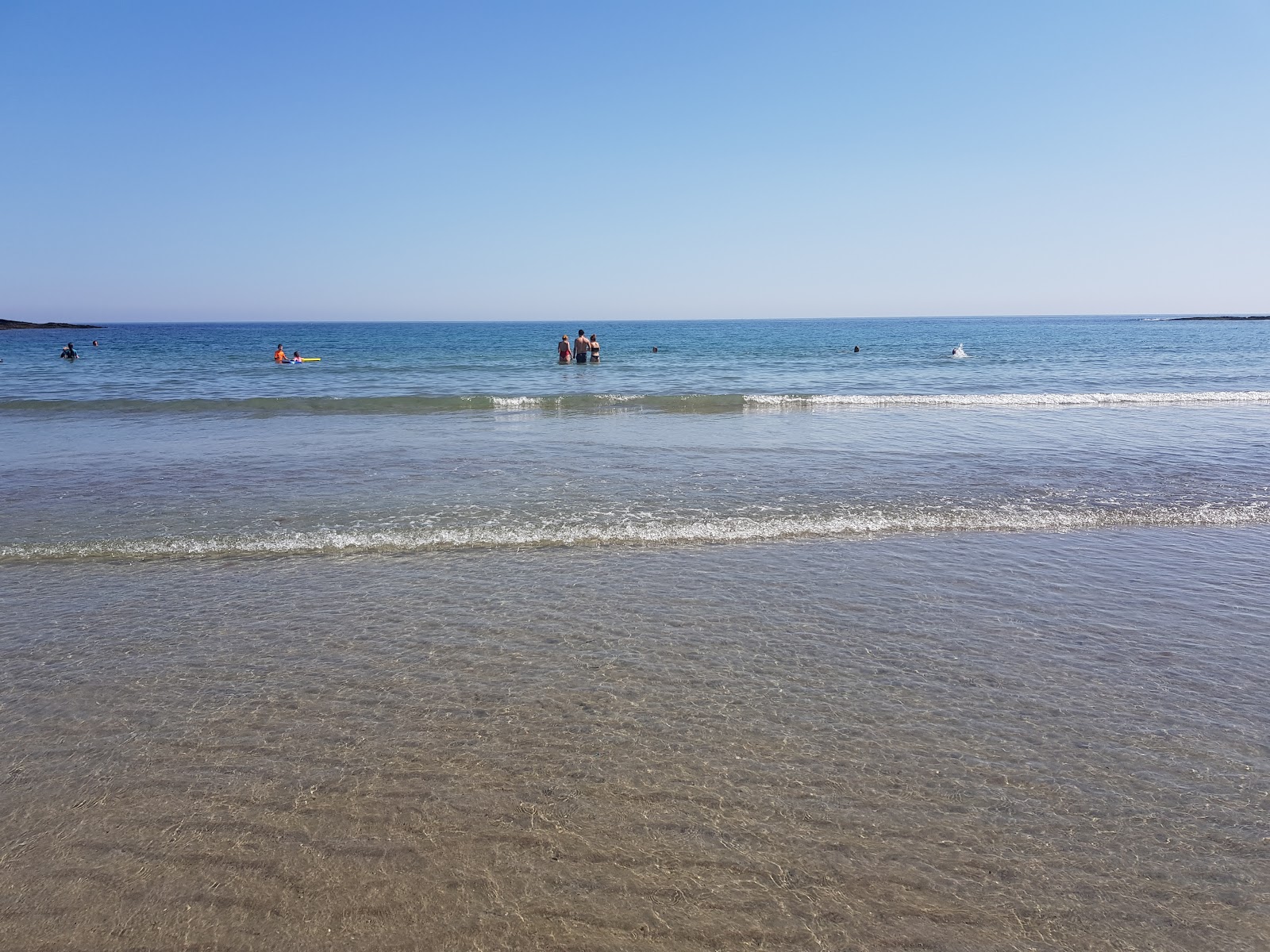 Foto von Howe Strand Bay Beach und die siedlung