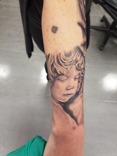 Explore dad and daughter tattoo ideas, creative tattoo ideas in Modesto, available at Ink Disciples Tattoo Parlor