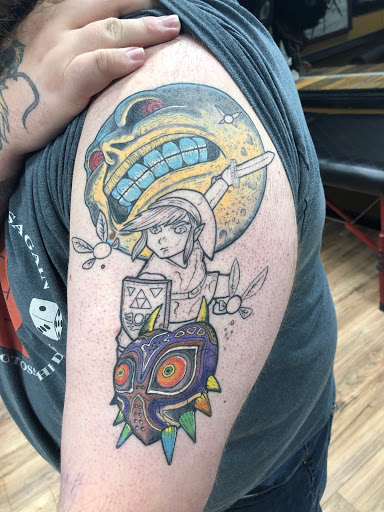 Explore tattoo sleeve ideas music, creative tattoo ideas in Lees Summit, available at Bleeding Heart Tattoo