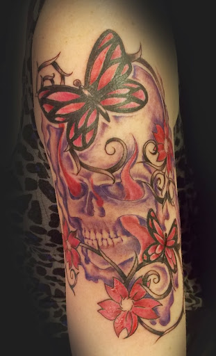 Explore mens armband tattoo ideas, creative tattoo ideas in Largo, available at Alchemy Tattoos and Body Piercings