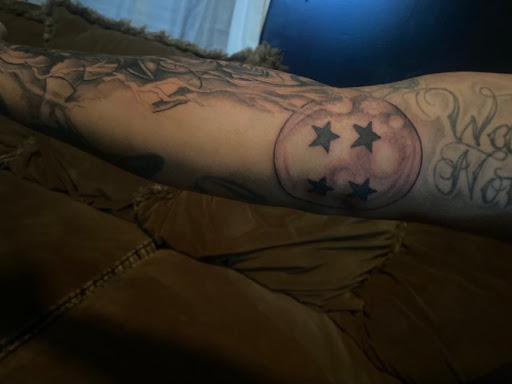 Explore wedding ring tattoo ideas for men, creative tattoo ideas in Fort Wayne, available at drieM World Tattoos & Art Gallery