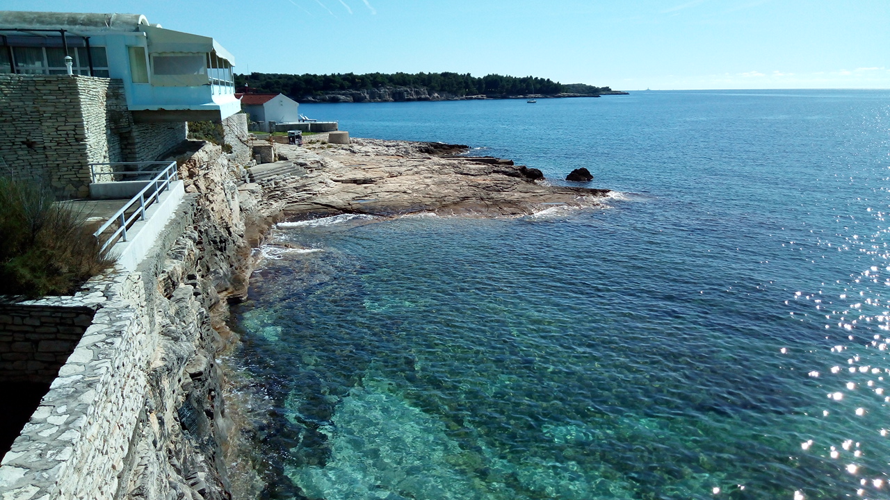 Fotografija Lighthouse beach in naselje