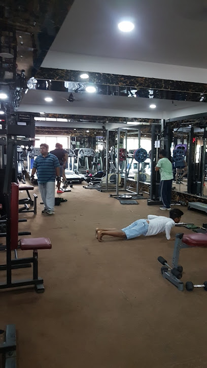 Fitness world - 142, Aambagan Rd, SNP Area, Ambagan, Sakchi, Jamshedpur, Jharkhand 831001, India