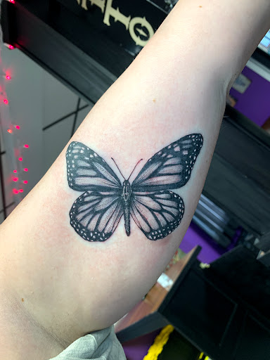 Explore deer hunting tattoo ideas, creative tattoo ideas in Goshen, available at Lady Luck Studio