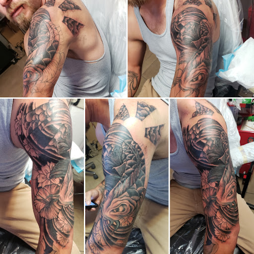 Explore inner bicep tattoo ideas for men, creative tattoo ideas in Elko, available at Tom Custom Tattoos and Body Piercing Studio