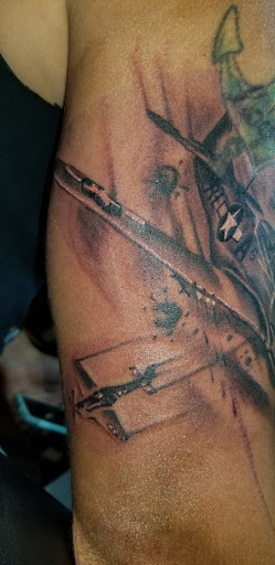 Explore tattoo ideas for mens, creative tattoo ideas in Angola, available at Hoodlum Ink