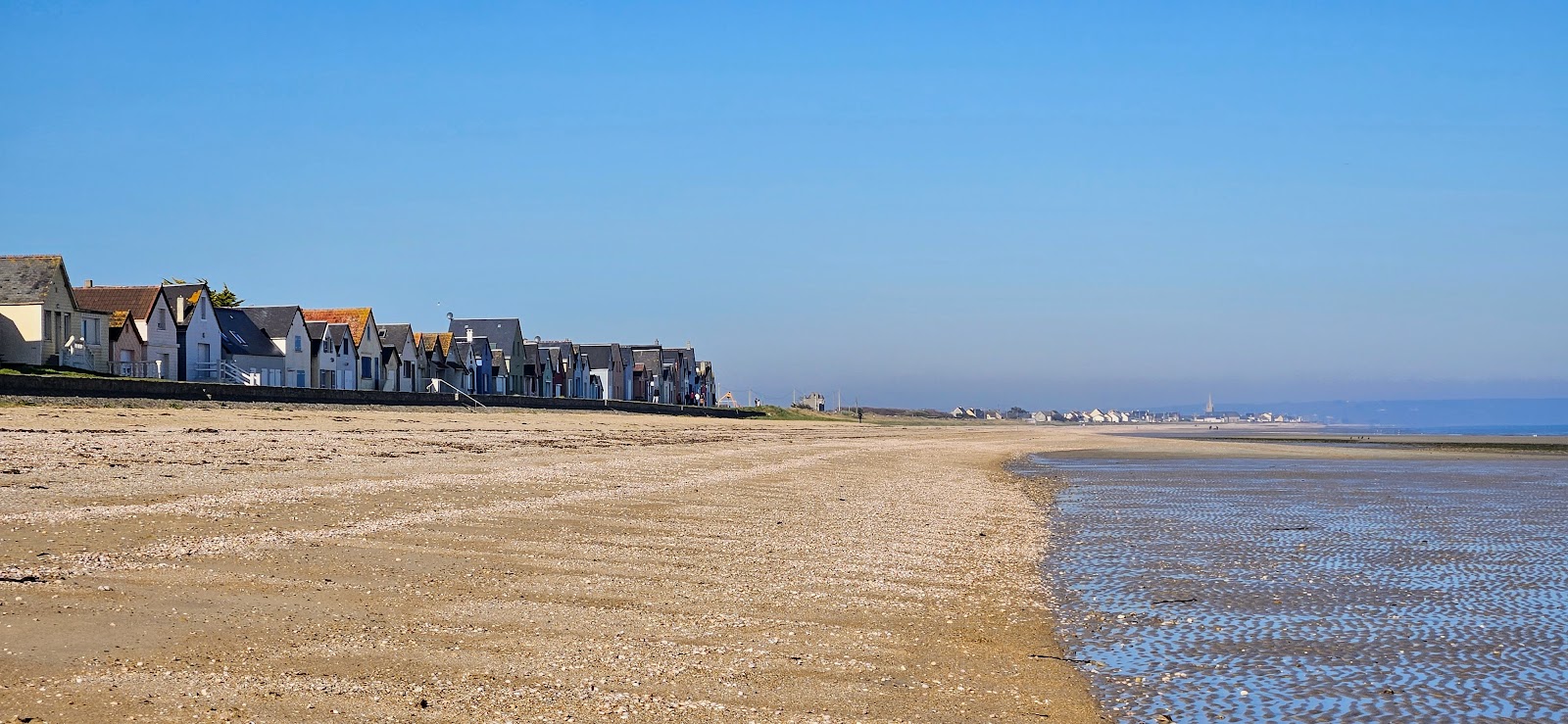 Foto von Ravenoville Strand und die siedlung