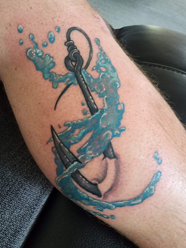 Explore color flower tattoo ideas, creative tattoo ideas in Minocqua, available at Walking Arts Tattoos