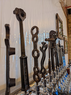 A row of beer taps