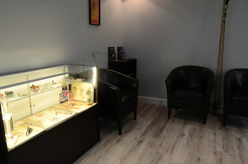 Explore tattoo ideas for black males, creative tattoo ideas in Murray, available at Gallery X Art Collective