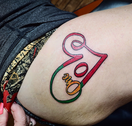 Explore traditional neck tattoo ideas, creative tattoo ideas in Fredonia, available at True Blue Tattoo