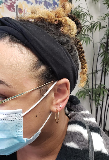 Explore religious elbow tattoo ideas, creative tattoo ideas in Bellevue, available at Just Your Ears Piercing & Permanent Jewelry Studio