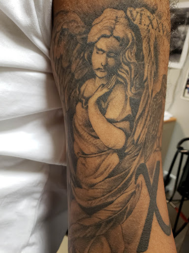 Explore forearm mens first tattoo ideas, creative tattoo ideas in Mastic, available at Infinity Tattoo