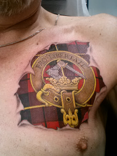 Explore hood tattoo ideas for men, creative tattoo ideas in Lockport, available at Tattoo City by Larry Brogan