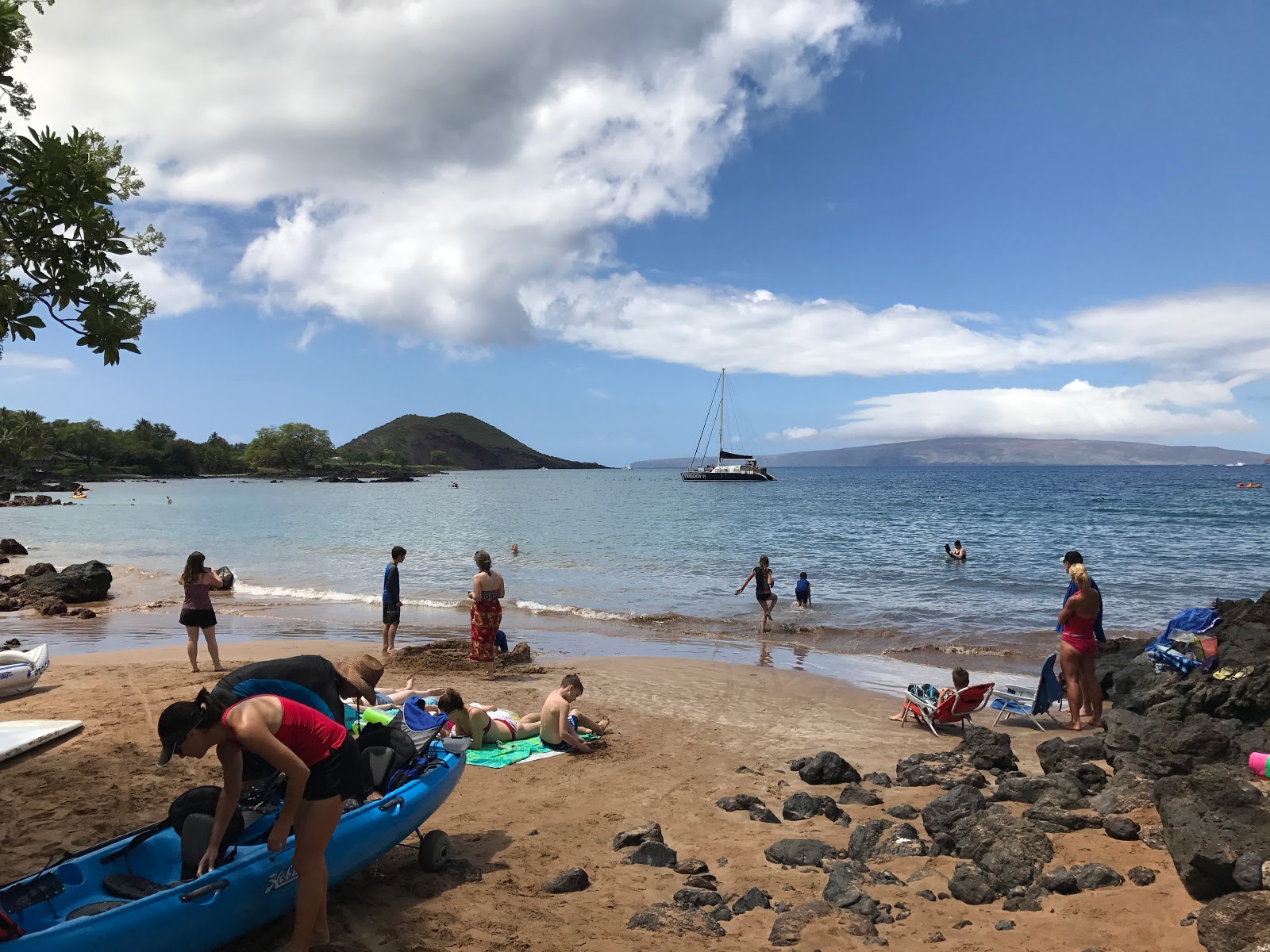 Photo of Makena Landing Beach backed by cliffs