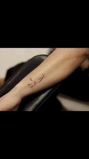 Explore tattoo ideas with color, creative tattoo ideas in Corona, available at Crop Circles Tattoo Studio