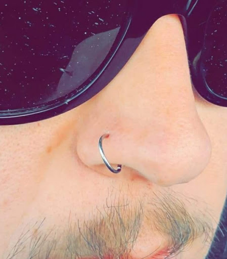 Explore patriotic forearm tattoo ideas, creative tattoo ideas in Laramie, available at Deviant Piercings and Tattoo