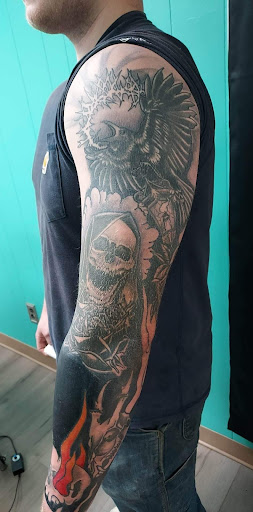 Explore patchwork sleeve tattoo ideas, creative tattoo ideas in Bangor, available at Blackhole Bodyart