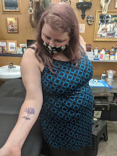 Explore black tattoo ideas for men, creative tattoo ideas in Newport News, available at Anavrin Tattoo & Body Piercing