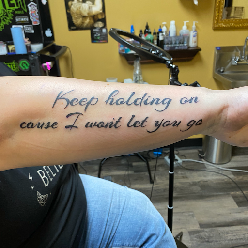 Explore athena tattoo ideas, creative tattoo ideas in Warner Robins, available at Untold Pain Tattoo Studio