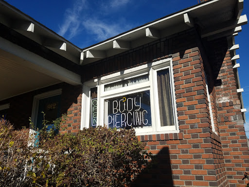 Explore 2008 tattoo ideas, creative tattoo ideas in Reno, available at Black Hole Body Piercing