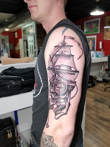 Find necklace tattoo ideas for your next unique tattoo in Virginia Beach at World Famous Blue Horseshoe Tattoo and Piercing Independence