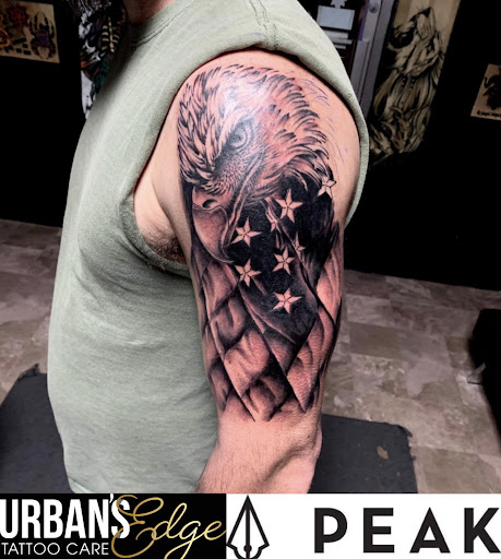 Explore cemetery tattoo ideas, creative tattoo ideas in Sunbury, available at Knuckles & Needles Tattoo Parlor
