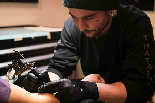 Explore forearm cross tattoo ideas, creative tattoo ideas in Kennewick, available at Powers Tattoo Company