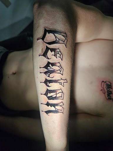 Explore tattoo ideas for grandchildren names, creative tattoo ideas in Angola, available at Hoodlum Ink