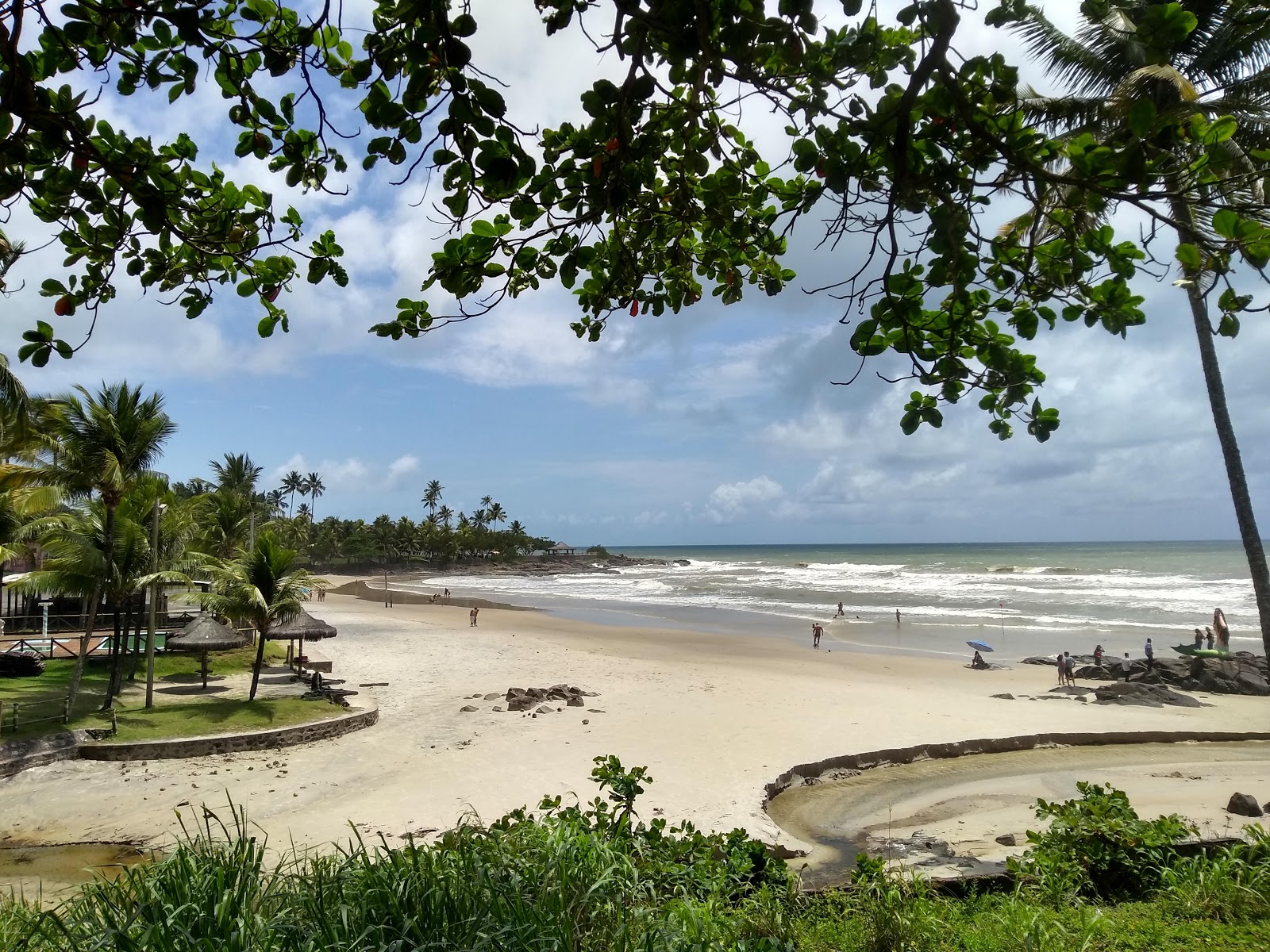 Foto von Praia Batuba mit feiner beiger sand Oberfläche