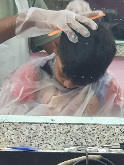 Kedai Gunting Rambut Muna