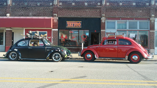 Explore weightlifting tattoos ideas, creative tattoo ideas in Peru, available at Inked Memories Tattoo Company