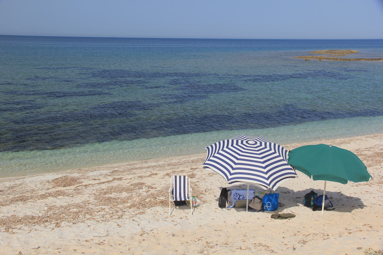 Foto von Spiaggia di Is Caogheddas mit geräumige küstenlinie