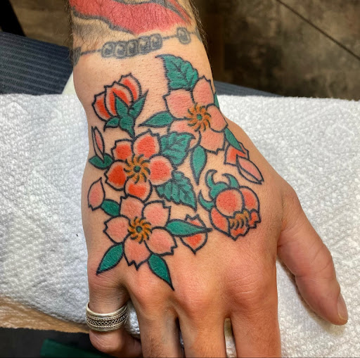 Explore colored tattoo ideas, creative tattoo ideas in Harrisonburg, available at Alley Cat Tattoo