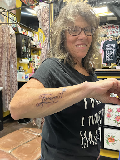 Explore tattoo ideas pin up, creative tattoo ideas in Asbury Park, available at Old Glory Tattoo Co.