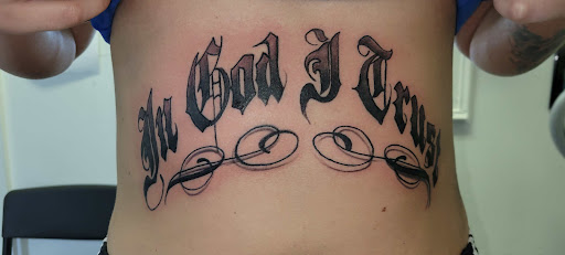 Explore rhea ripley tattoo ideas, creative tattoo ideas in Angola, available at Hoodlum Ink