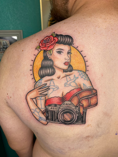 Explore dog ears tattoo ideas, creative tattoo ideas in Apple Valley, available at Tried and True Tattoo Parlor