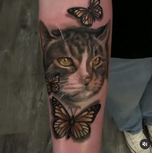 Explore arm mens tattoo ideas, creative tattoo ideas in Clinton, available at Black Relic Tattoo